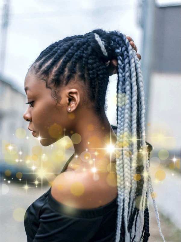 Braided ponytail hairstyle with ombre extensions by Fabulous Unisex Salon